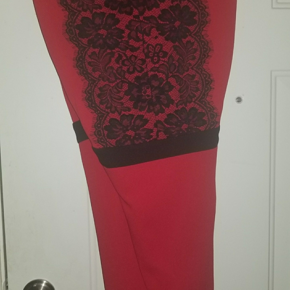Red Knee length dress with black lace on bodice